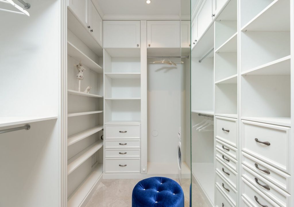 White classic styled built in wardrobe with empty shelves